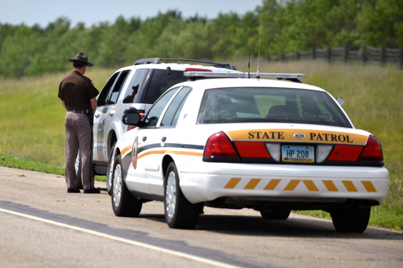 Highway Patrol pulling over vehicle on Interstate 94.
