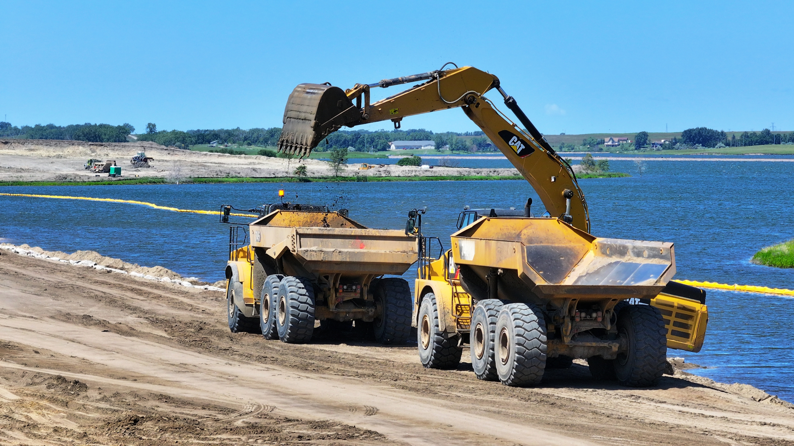 Construction vehicles near water